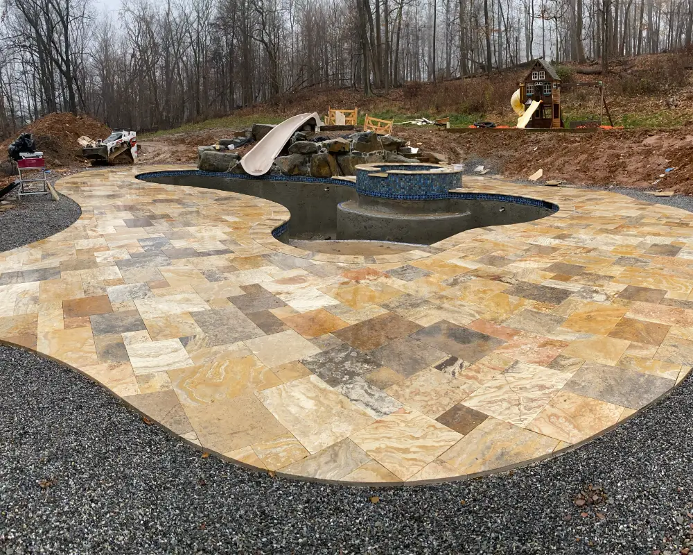 Travertine Pool Deck Install — TruScapes project in Central Minnesota